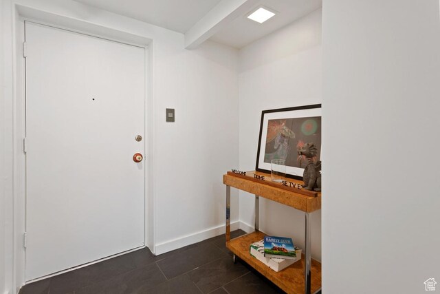 515 S 1000 E Unit 504, Salt Lake City, UT 84102 - entryway with baseboards and dark tile patterned floors