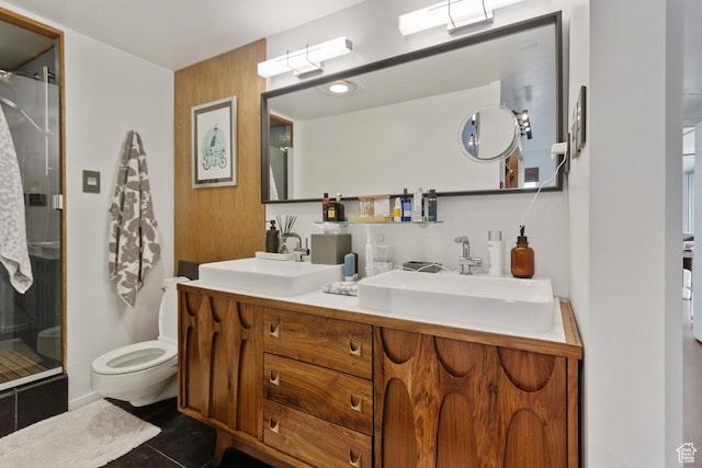 515 S 1000 E Unit 504, Salt Lake City, UT 84102 - full bathroom with a sink, toilet, a shower stall, and tile patterned flooring