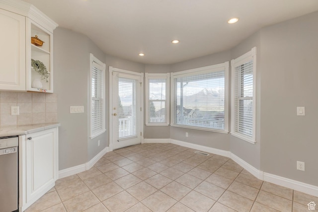 390 Ridge Dr, Heber City, UT 84032 - unfurnished dining area with recessed lighting, light tile patterned floors, visible vents, and baseboards