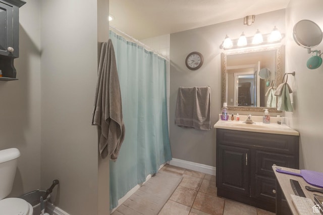 390 Ridge Dr, Heber City, UT 84032 - bathroom with vanity, toilet, a shower with shower curtain, tile patterned floors, and baseboards