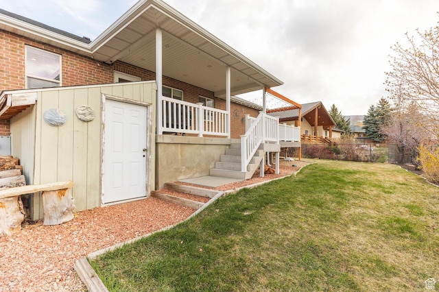 390 Ridge Dr, Heber City, UT 84032 - exterior space with brick siding, stairway, and a yard