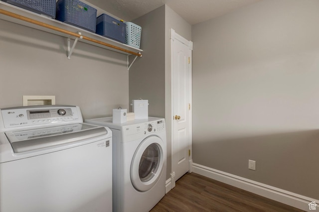 390 Ridge Dr, Heber City, UT 84032 - laundry room featuring dark wood-type flooring, baseboards, washer and dryer, and laundry area