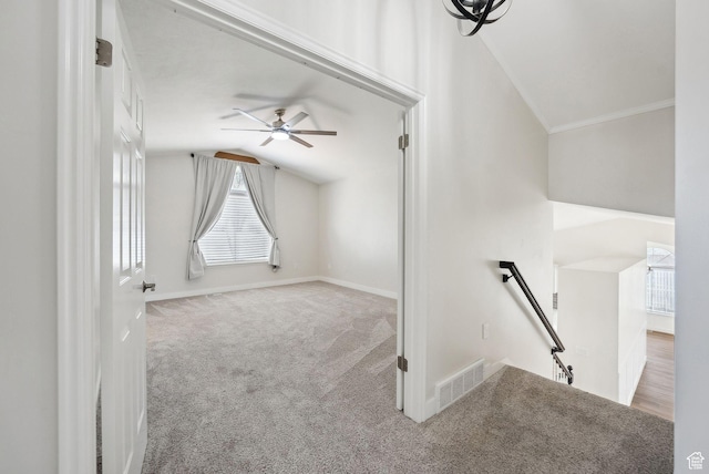 bonus room with baseboards, vaulted ceiling, a ceiling fan, carpet floors, and visible vents