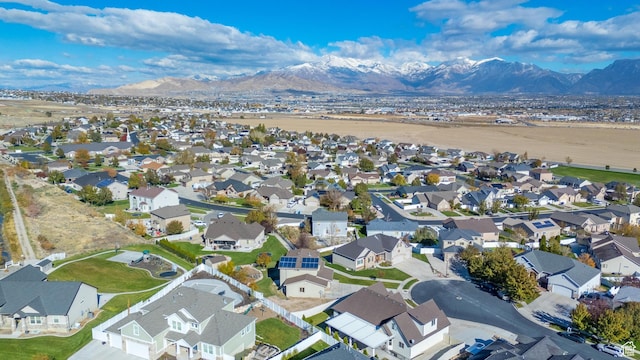 aerial view featuring a mountain view and a residential view