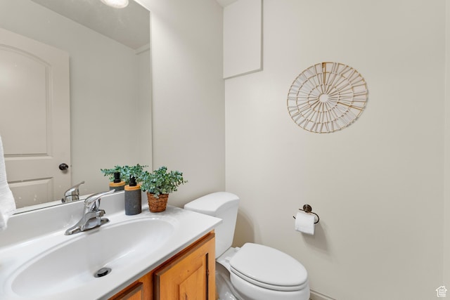 half bath with toilet and vanity