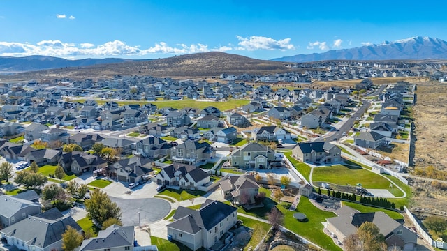 aerial view with a mountain view and a residential view