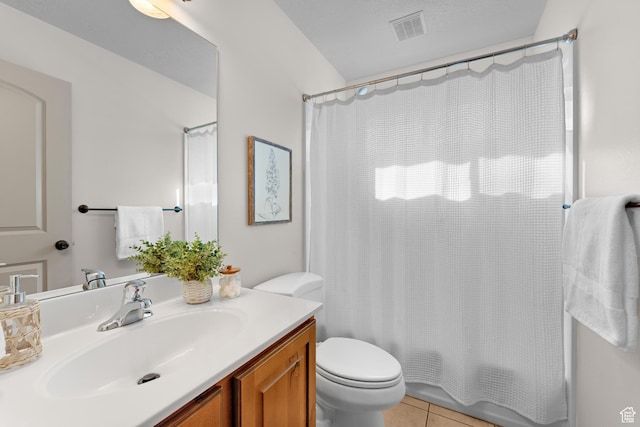 bathroom featuring visible vents, toilet, shower / bathtub combination with curtain, vanity, and tile patterned flooring