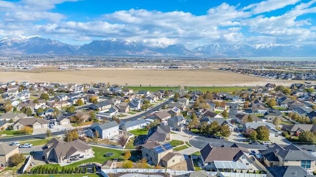 drone / aerial view with a residential view and a mountain view