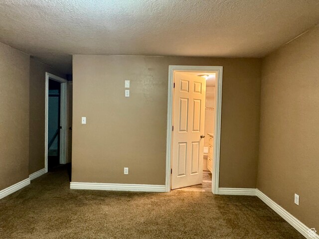 781 N Sherwood Dr, Layton, UT 84041 - carpeted empty room with a textured ceiling and baseboards