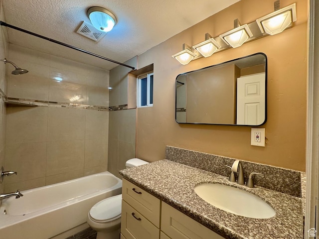 781 N Sherwood Dr, Layton, UT 84041 - bathroom featuring visible vents, washtub / shower combination, toilet, a textured ceiling, and vanity
