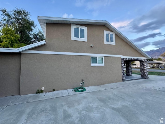 781 N Sherwood Dr, Layton, UT 84041 - view of side of property with a patio area and stucco siding