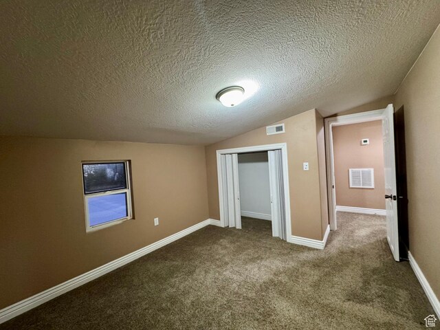 781 N Sherwood Dr, Layton, UT 84041 - unfurnished bedroom with visible vents, a closet, vaulted ceiling, and carpet floors