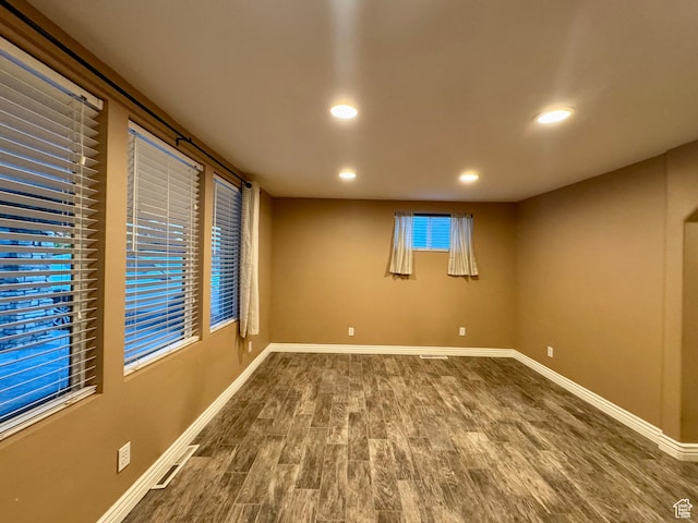 781 N Sherwood Dr, Layton, UT 84041 - below grade area featuring dark wood-style flooring, baseboards, visible vents, and recessed lighting