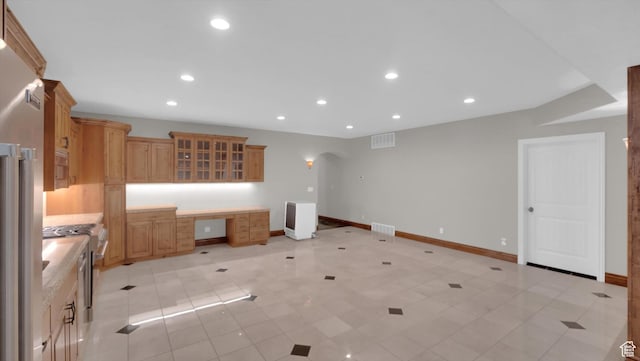 2847 W Amini Way S, Jordan, UT 84095 - kitchen featuring visible vents, baseboards, glass insert cabinets, recessed lighting, and gas stove