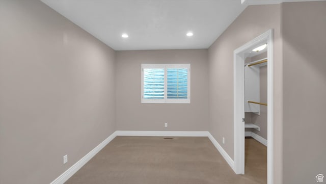 2847 W Amini Way S, Jordan, UT 84095 - unfurnished bedroom with light colored carpet, baseboards, and recessed lighting