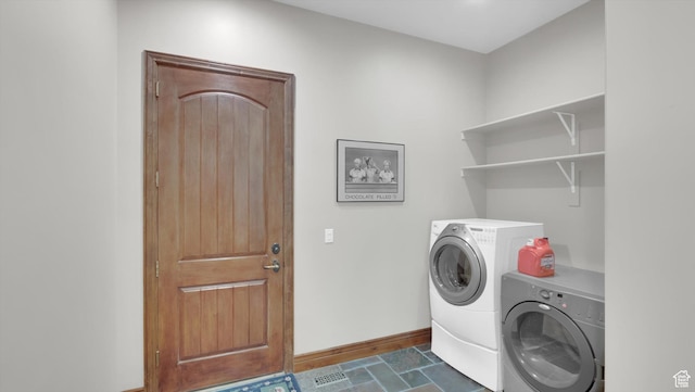 2847 W Amini Way S, Jordan, UT 84095 - clothes washing area with baseboards, washer and clothes dryer, and laundry area