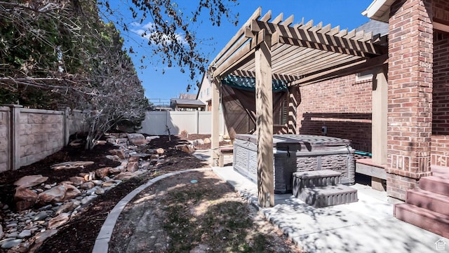 2847 W Amini Way S, Jordan, UT 84095 - view of patio featuring a fenced backyard, a pergola, and a hot tub