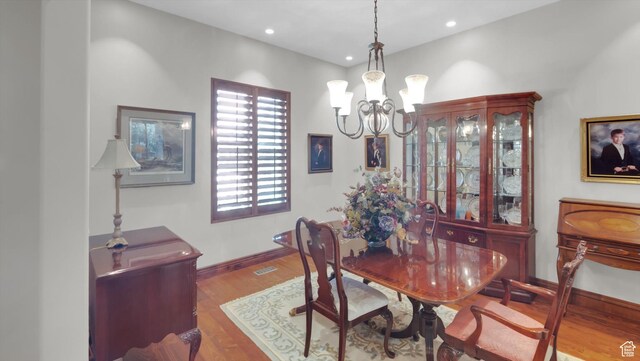 2847 W Amini Way S, Jordan, UT 84095 - dining area with an inviting chandelier, visible vents, recessed lighting, wood finished floors, and baseboards