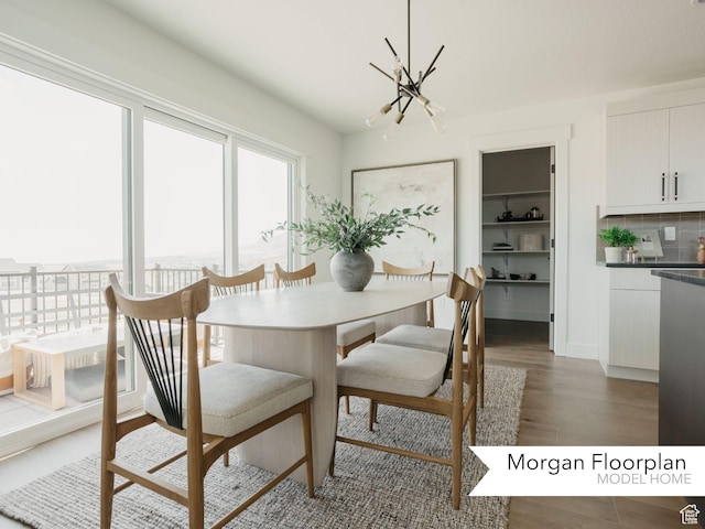 13678 S Langdon Dr Unit 2315, Riverton, UT 84096 - dining area featuring a notable chandelier and wood finished floors
