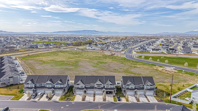 aerial view featuring a mountain view and a residential view