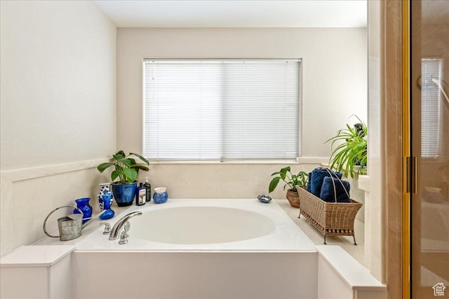 full bathroom with a bath
