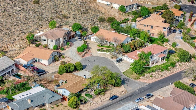 birds eye view of property with a residential view
