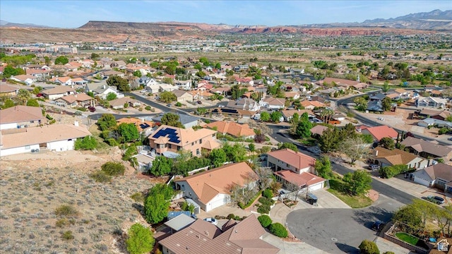 aerial view featuring a mountain view and a residential view
