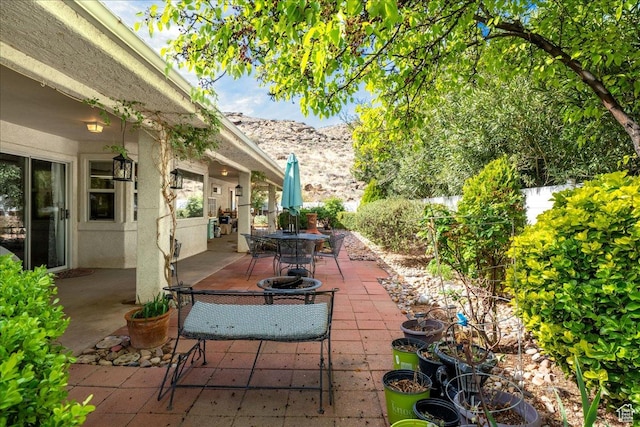 view of patio / terrace featuring fence