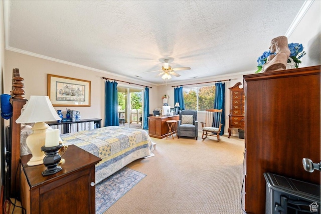 carpeted bedroom featuring access to exterior, a textured ceiling, crown molding, and a ceiling fan