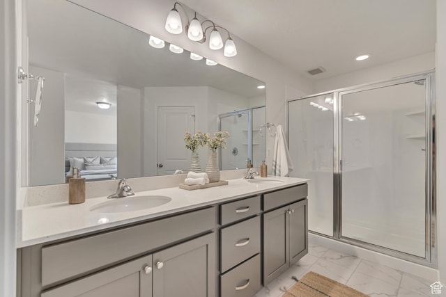 6864 S Static Peak Dr Unit 258, West Jordan, UT 84081 - ensuite bathroom featuring double vanity, marble finish floor, a stall shower, and a sink