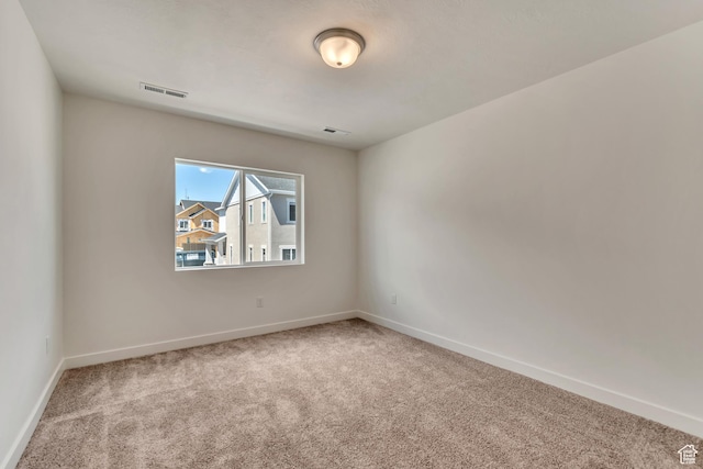 6864 S Static Peak Dr Unit 258, West Jordan, UT 84081 - carpeted spare room featuring baseboards and visible vents