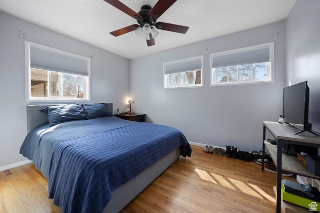 4622 S 375 E, Washington Terrace, UT 84405 - bedroom featuring ceiling fan, wood-type flooring, multiple windows, and baseboards