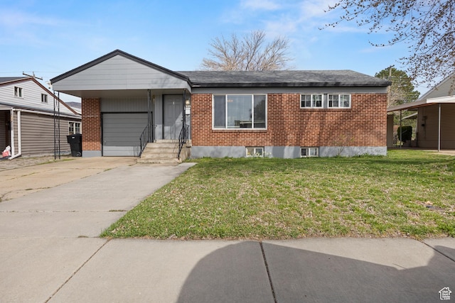 4622 S 375 E, Washington Terrace, UT 84405 - view of front of home featuring an attached garage, concrete driveway, a front lawn, and brick siding