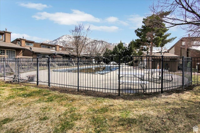 1298 Lorl Ln Unit 2, Ogden, UT 84404 - community pool with a patio area, a mountain view, and fence