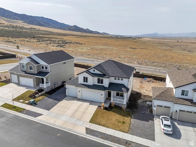 2888 E Carriage Hill Dr, Eagle Mountain, UT 84005 - bird's eye view featuring a rural view and a mountain view