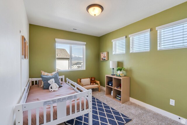 2888 E Carriage Hill Dr, Eagle Mountain, UT 84005 - bedroom with visible vents, baseboards, multiple windows, and carpet
