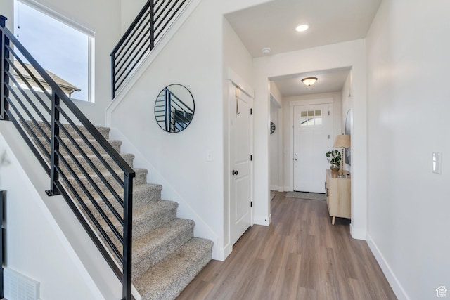 2888 E Carriage Hill Dr, Eagle Mountain, UT 84005 - interior space featuring visible vents, baseboards, recessed lighting, and wood finished floors