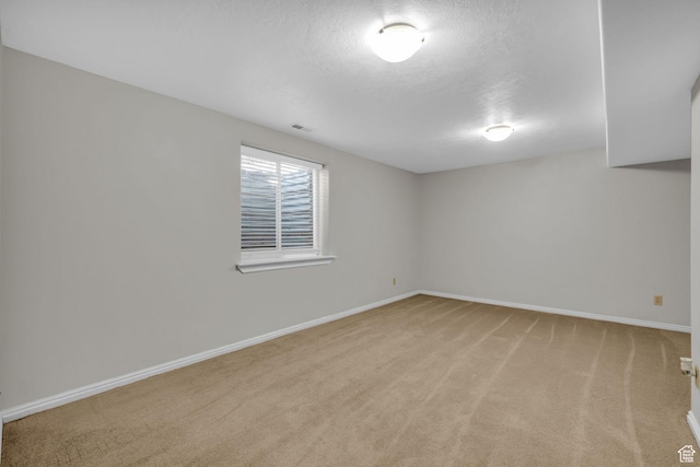307 E 680 N, Lindon, UT 84042 - empty room with visible vents, baseboards, light colored carpet, and a textured ceiling