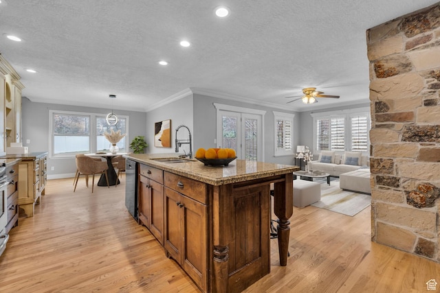 307 E 680 N, Lindon, UT 84042 - kitchen featuring light wood-type flooring, crown molding, brown cabinets, dishwashing machine, and a sink