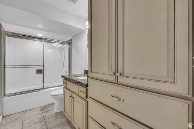307 E 680 N, Lindon, UT 84042 - bathroom with toilet, tile patterned floors, vanity, and combined bath / shower with glass door