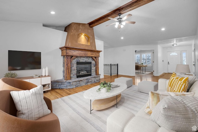 307 E 680 N, Lindon, UT 84042 - living area with a stone fireplace, a ceiling fan, recessed lighting, wood finished floors, and vaulted ceiling with beams