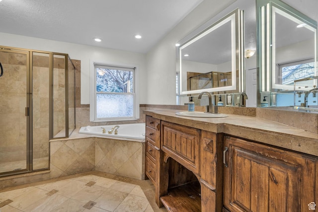 307 E 680 N, Lindon, UT 84042 - full bath featuring a bath, a shower stall, vanity, and recessed lighting