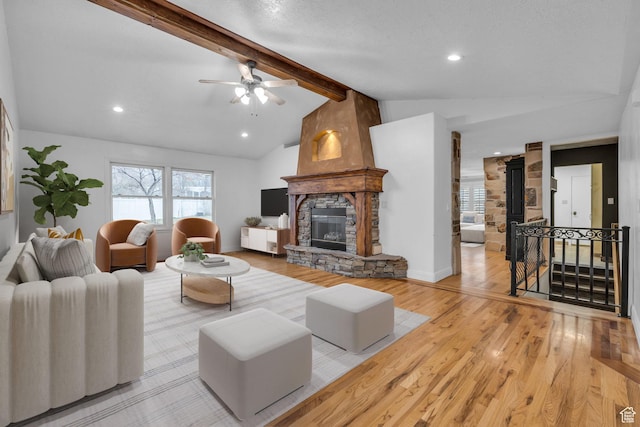 307 E 680 N, Lindon, UT 84042 - living area with ceiling fan, light wood-style floors, a fireplace, recessed lighting, and vaulted ceiling with beams