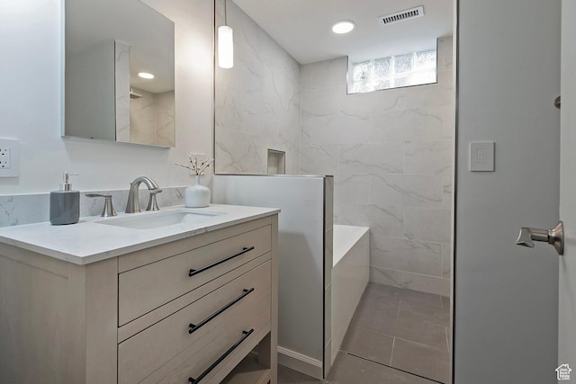 579 E 13th Ave, Salt Lake City, UT 84103 - full bath featuring a tub, vanity, visible vents, recessed lighting, and walk in shower