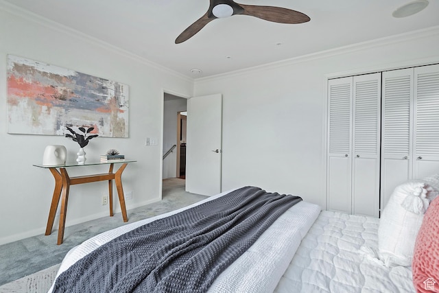 579 E 13th Ave, Salt Lake City, UT 84103 - carpeted bedroom with crown molding, a closet, baseboards, and a ceiling fan