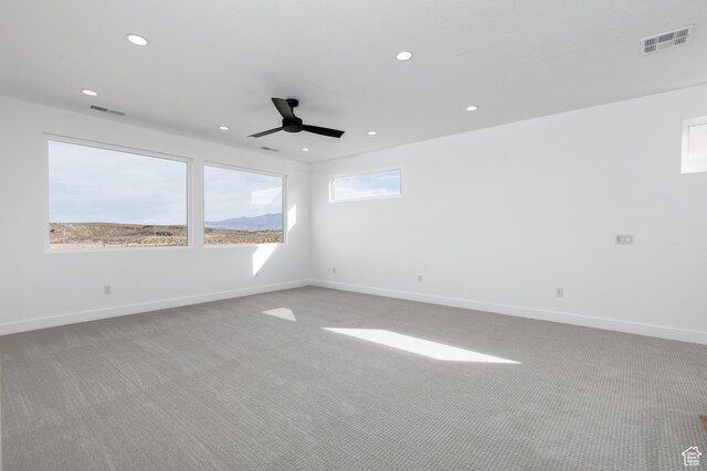 4153 El Capitan Way, St George, UT 84790 - empty room featuring visible vents, a ceiling fan, and light colored carpet