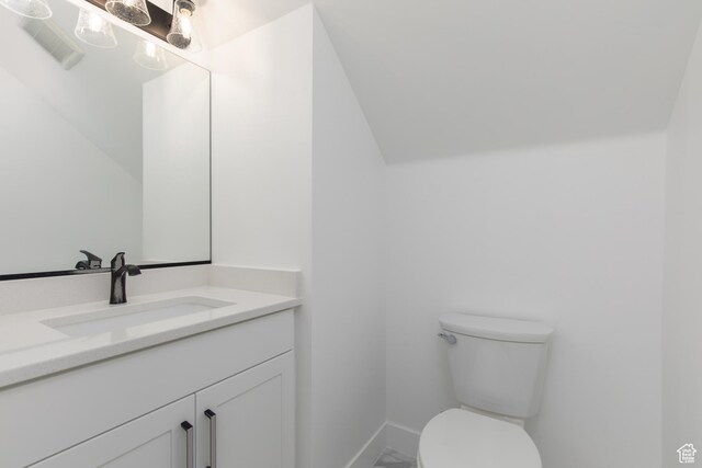4153 El Capitan Way, St George, UT 84790 - bathroom featuring vanity, baseboards, and toilet