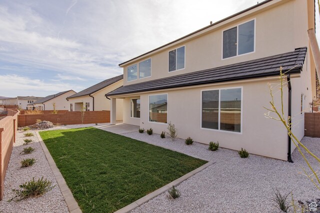 4153 El Capitan Way, St George, UT 84790 - back of property with a patio, a fenced backyard, and stucco siding