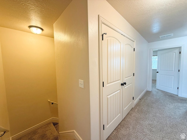 141 E 620 S, Smithfield, UT 84335 - hall with a textured ceiling, carpet flooring, and visible vents