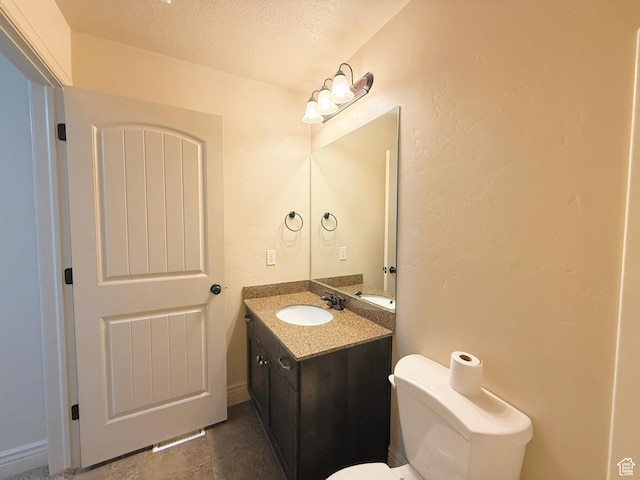 141 E 620 S, Smithfield, UT 84335 - half bathroom with toilet, a textured ceiling, and vanity